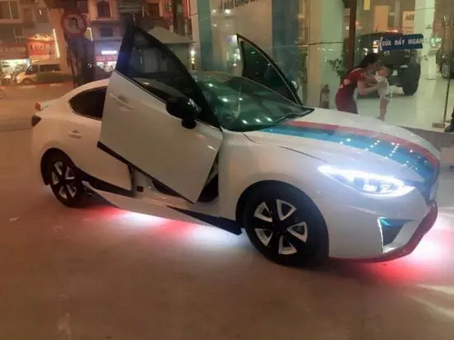 Nở rộ trào lưu độ cửa xe cắt kéo tại Việt Nam - ảnh 6