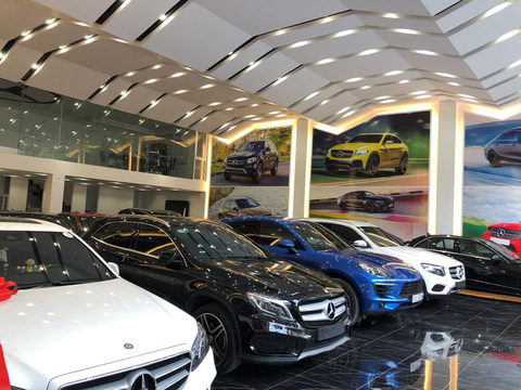 mirrored surfaces adorn XU studios car showroom in shanghai