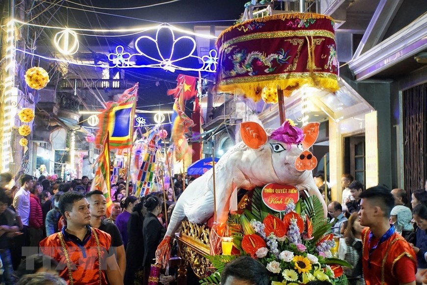 La Phu pig procession festival is held annually on the 13<sup>th</sup> day of the first lunar month in La Phu village, Hoai Duc district (Photo: VNA)<br />