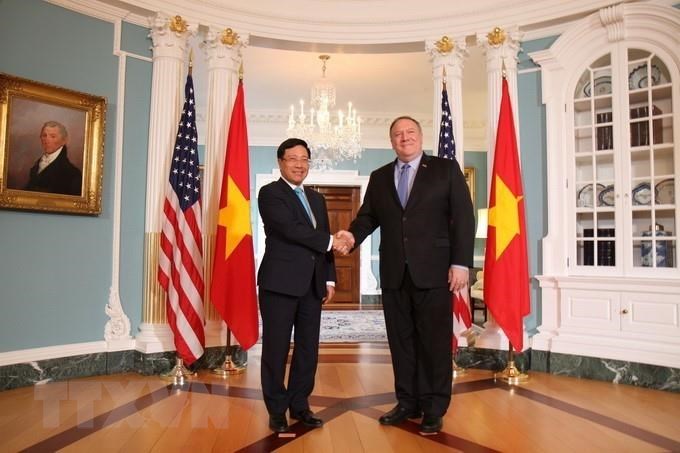 US Secretary of State Mike Pompeo welcomes and holds talks with Deputy Prime Minister and Foreign Minister Pham Binh Minh during his official visit to the US from May 22-23, 2019 (Photo: VNA)