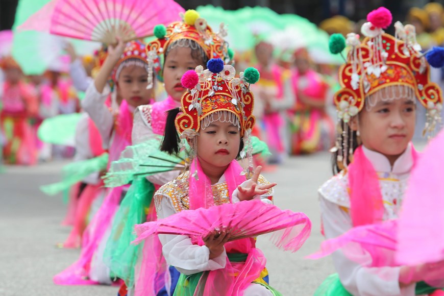 Children performing a dance in the Ca tru (ceremonial singing) arts (Photo: VNA)