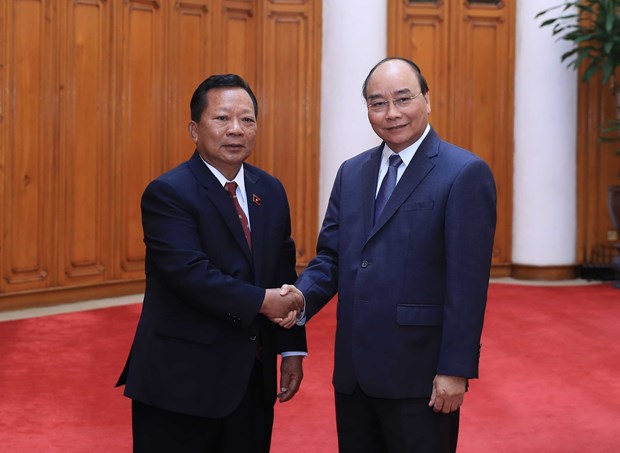 PM welcomes Cambodian, Lao defence ministers hinh anh 3