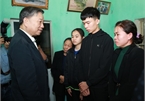 Minister visits families of police officers died in disturbance in Dong Tam