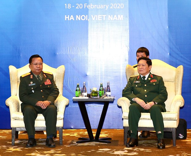 ASEAN 2020: Defence ministers of Vietnam, Laos meet in Hanoi hinh anh 1