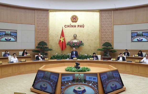 PM requests stronger countermeasures against COVID-19 hinh anh 1