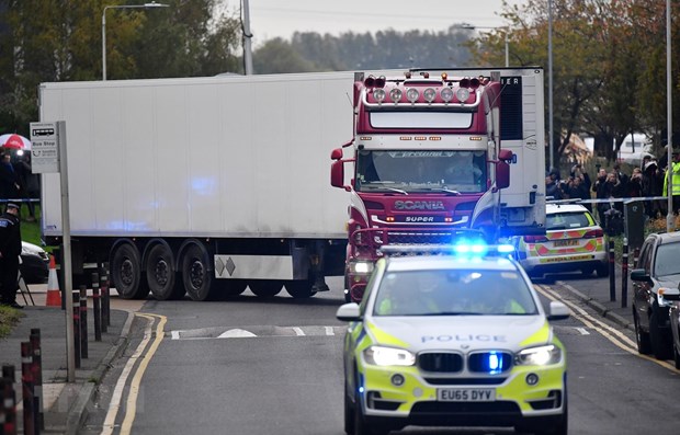 UK police charge another over Essex lorry deaths