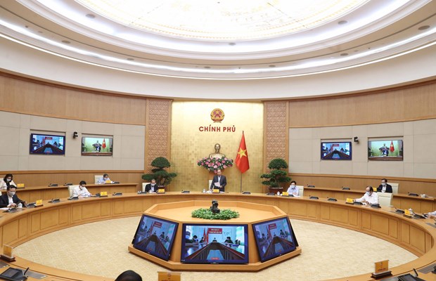 Promoting national solidarity, cooperation in COVID-19 fight: PM hinh anh 1