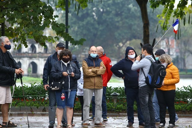 Foreigners not penalised for overstaying during national social distancing hinh anh 1