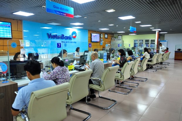 Banks to offer credit packages for customers affected by COVID-19 hinh anh 1