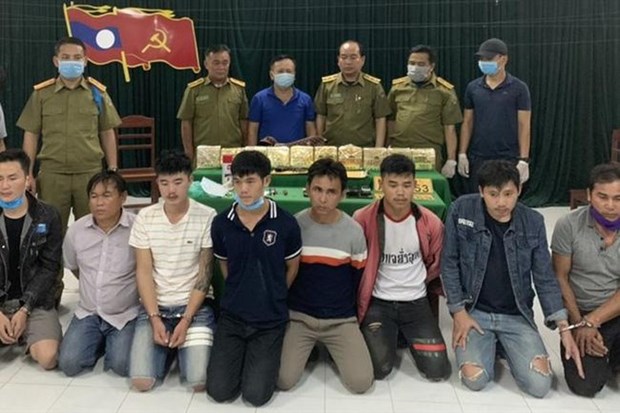 Eight Lao nationals caught smuggling 10kg of meth into Vietnam hinh anh 1