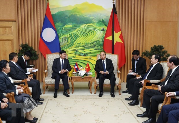 Vietnam, Laos determined to foster comprehensive cooperation hinh anh 1