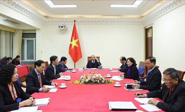 Prime Minister holds phone talks with US President hinh anh 3