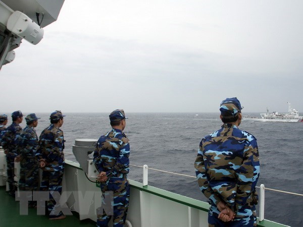 Vietnam, China hold new round of talks on sea-related issues hinh anh 1