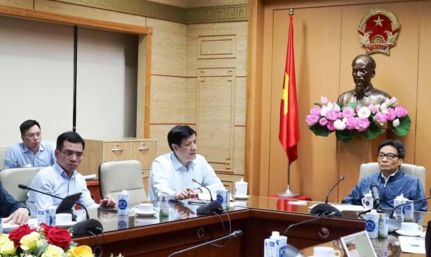 Health ministry takes action following confirmation of two community COVID-19 cases hinh anh 2