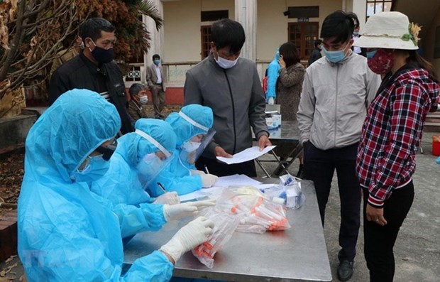 Vietnam records 33 new COVID-19 cases on February 14 evening hinh anh 1