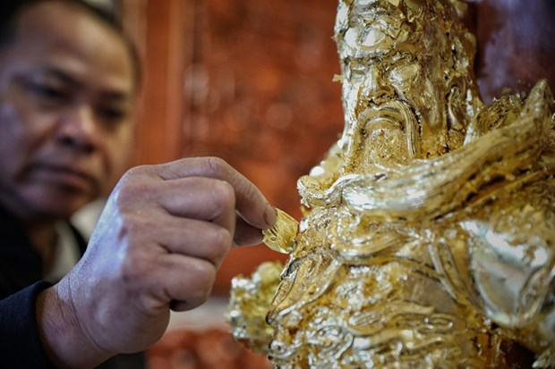 Gold laminating and gilding in Kieu Ky village recognised as national heritage hinh anh 1