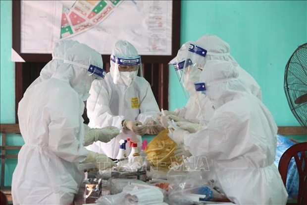 Vietnam sees 37 new domestic COVID-19 infections in 12 hours hinh anh 1