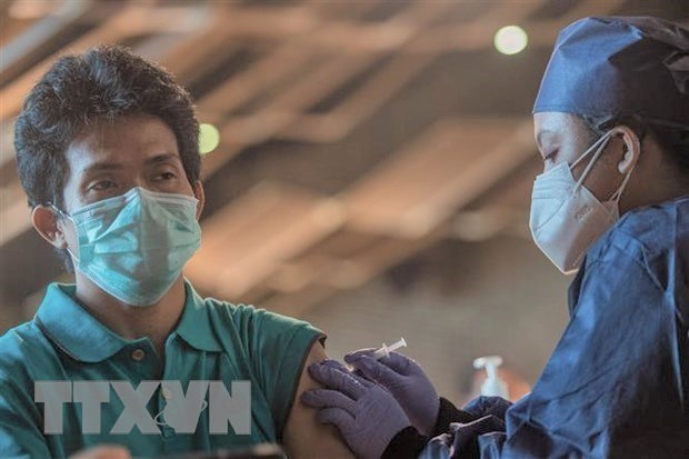 Vietnam concerned about unequal COVID-19 vaccination among nations hinh anh 1