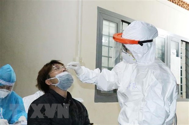 Additional 7,623 COVID-19 cases, infections in HCM City halve hinh anh 1