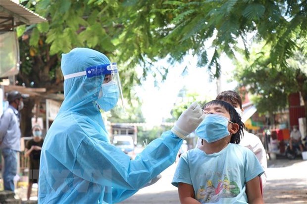 Vietnam records additional 9,605 COVID-19 cases hinh anh 1