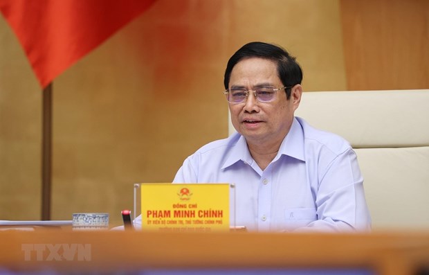 PM chairs national teleconference on COVID-19 prevention and control hinh anh 1