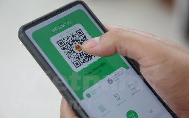 National single app for COVID-19 control PC-Covid debuts hinh anh 1