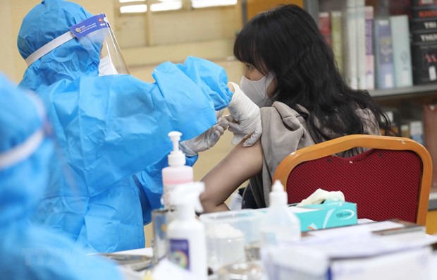 PM: vaccination campaign needs to speed up hinh anh 1