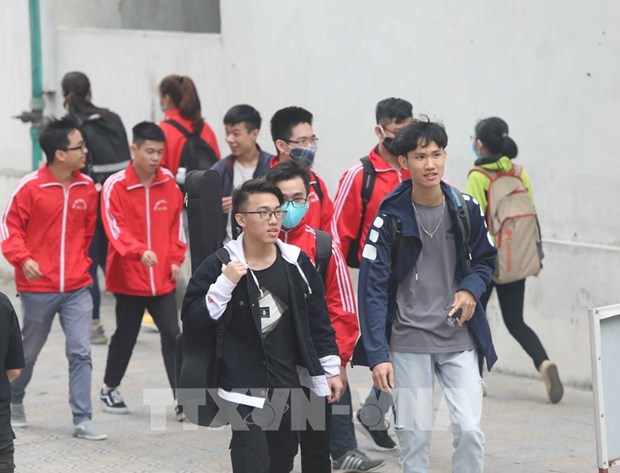Universities plan to receive students for in-person learning after Tet