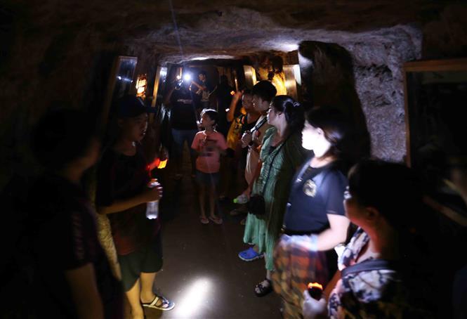 The hall serves as a place for meetings, arts performance and movie screening (Photo: VNA)