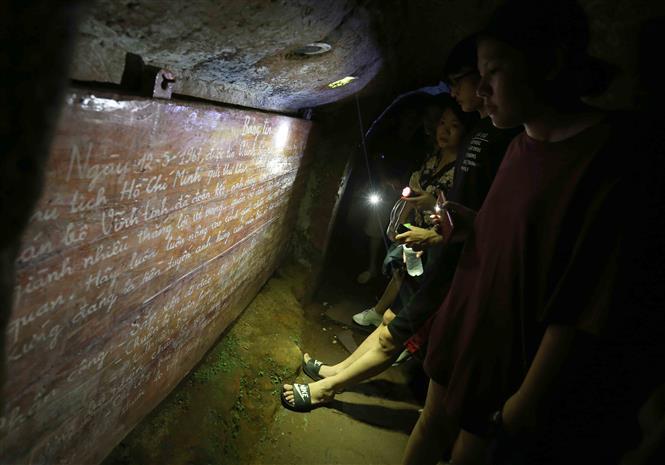 Information board for people living in the tunnel (Photo: VNA)