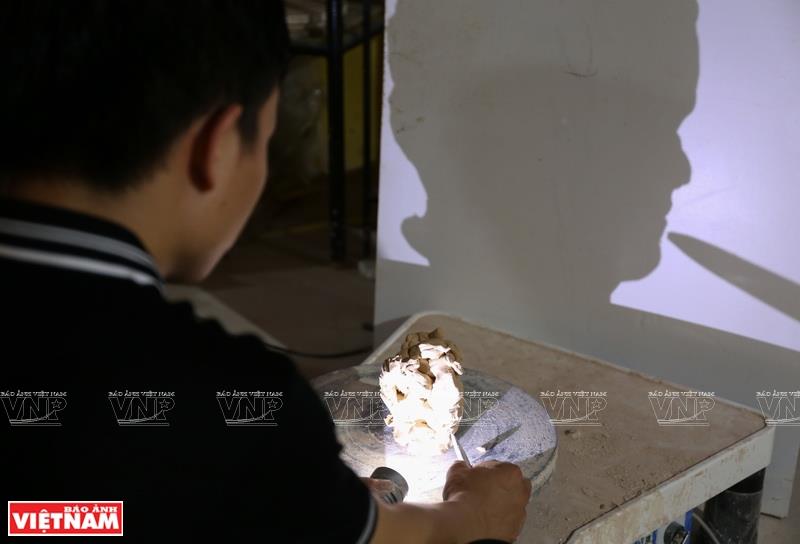 According to Tu, a wooden work is very complicated as a single mistake can ruin the whole work (Photo: VNA)