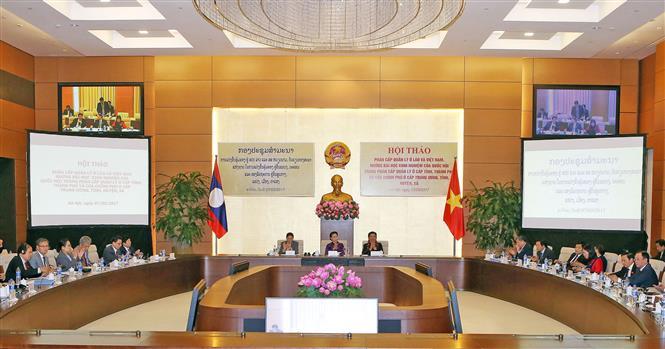 National Assembly Chairwoman Nguyen Thi Kim Ngan and her Lao counterpart Pany Yathotou co-chair a workshop to share experience in management decentralisation from the central to the grassroots levels, Hanoi March 7, 2017 (Photo: VNA)