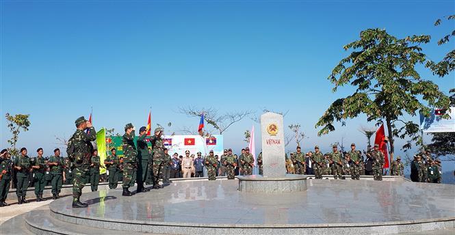 Border guards of Vietnam, Laos and Cambodia conduct border marker salute ceremony as part of the joint border patrol programme (Photo: VNA)