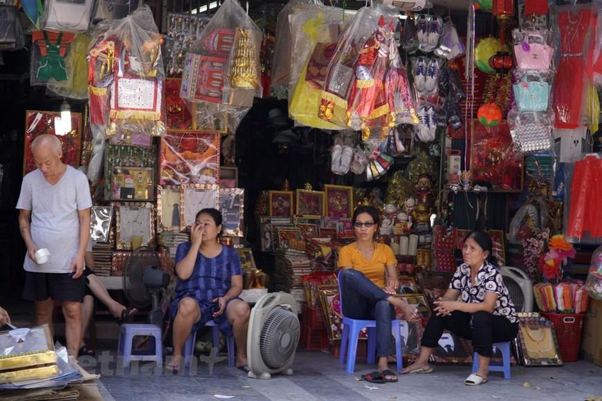 Market slumps this year as many people oppose the practice of burning votive offerings as a waste of money that they say raises the risk of fires and explosions and must be banned (Photo: VNA)