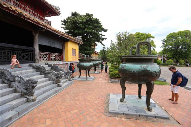 The set of nine tripod cauldrons are placed in The Mieu yard in Hue imperial city, representing the wish about everlasting existence of the Nguyen Dynasty and a prosperous country (Photo: VNA)