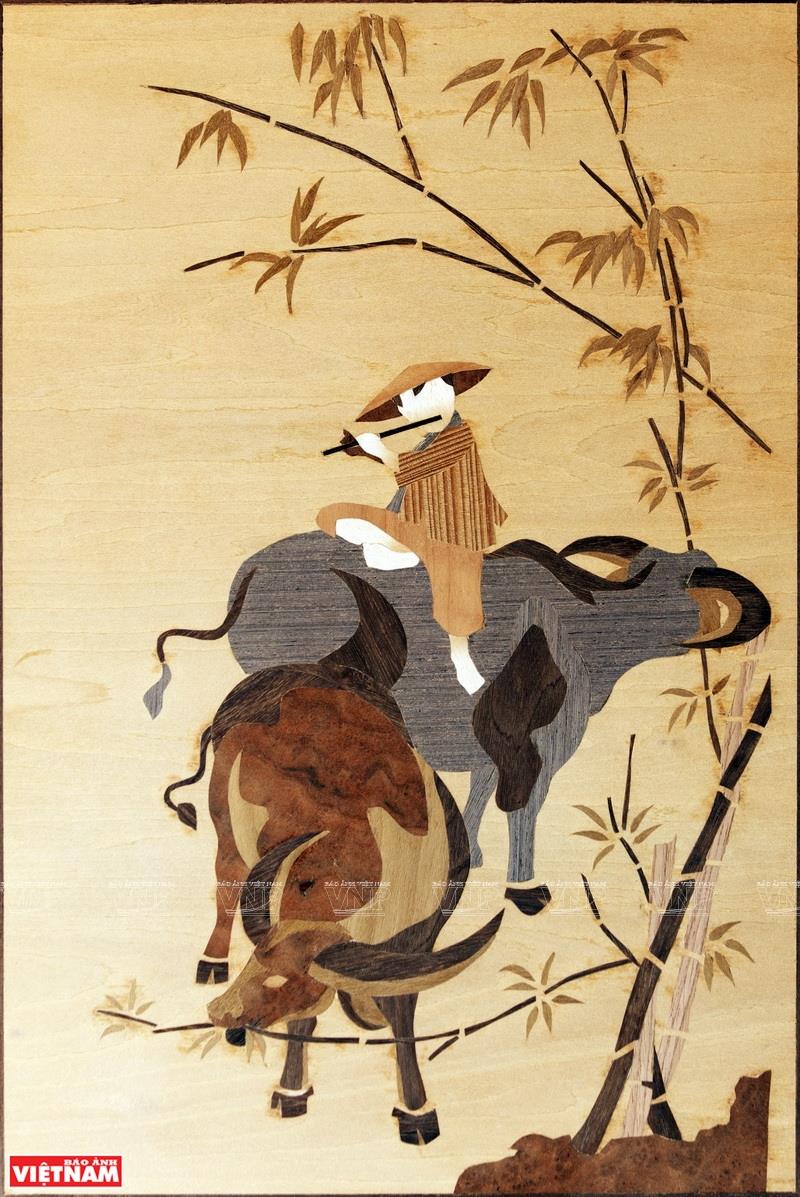 The themes of Ky’s marquetry pictures are diverse, but a large part of them is about the natural scenery and people of Vietnam (Photo: VNA)