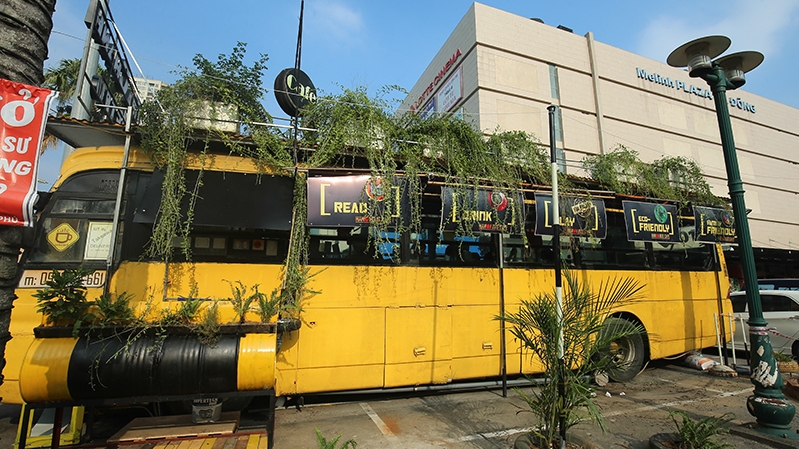 Visiting a cafeteria on a scrap bus in Hanoi