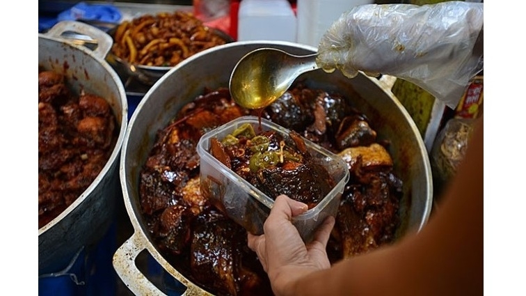 Hanoi traditional values feature in Old Quarter braised fish