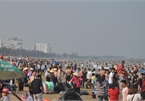Thousands flock to beach after social distancing rules ease