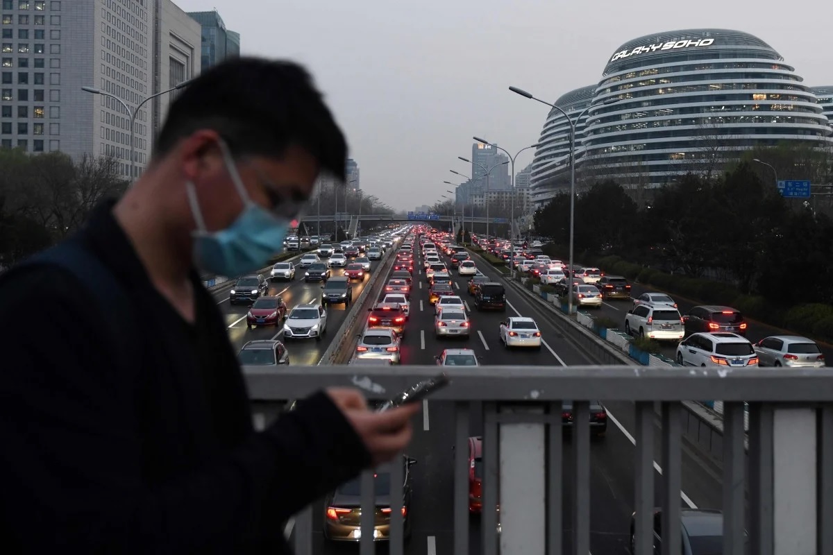 Thành phố Trung Quốc chấm điểm công dân qua ứng dụng di động - 1