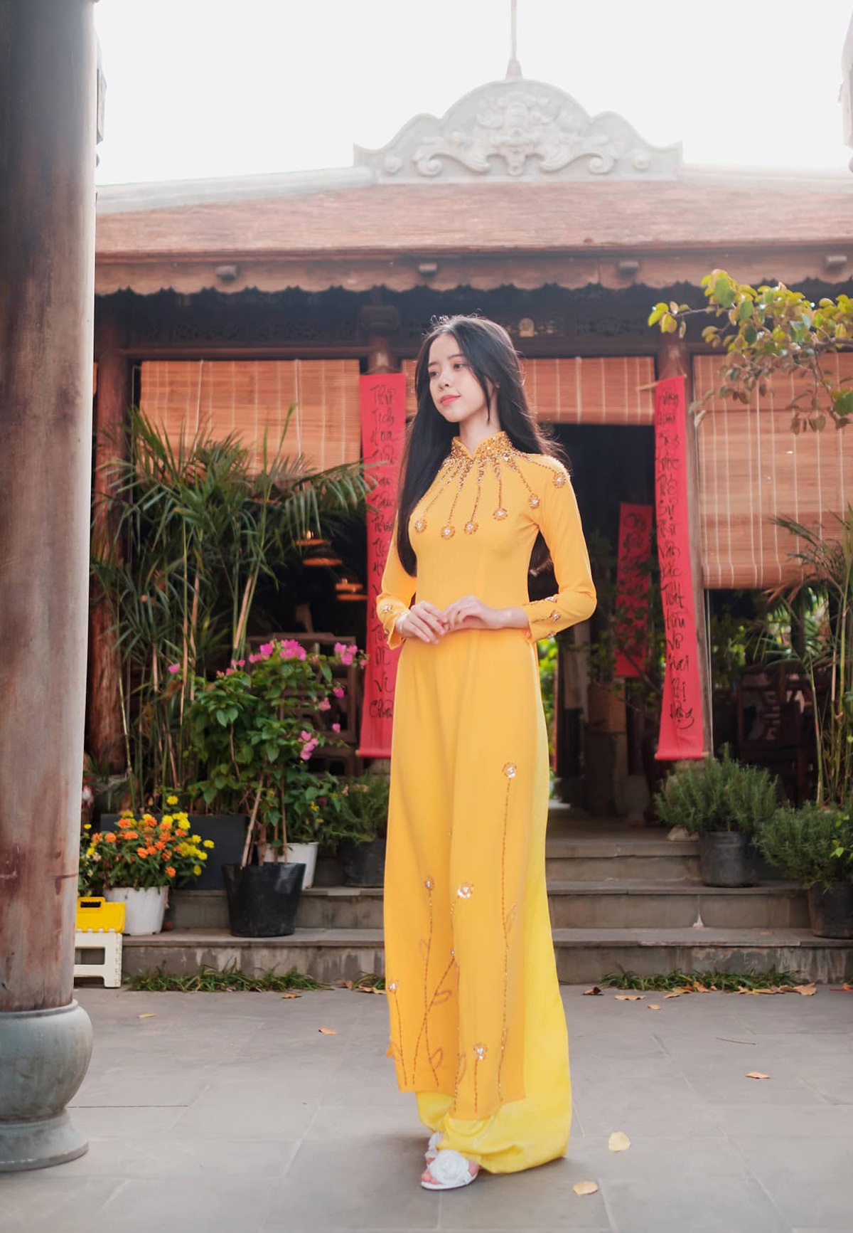 Nữ sinh Đà Nẵng khoe sắc xuân thì trong tà áo dài duyên dáng - 9