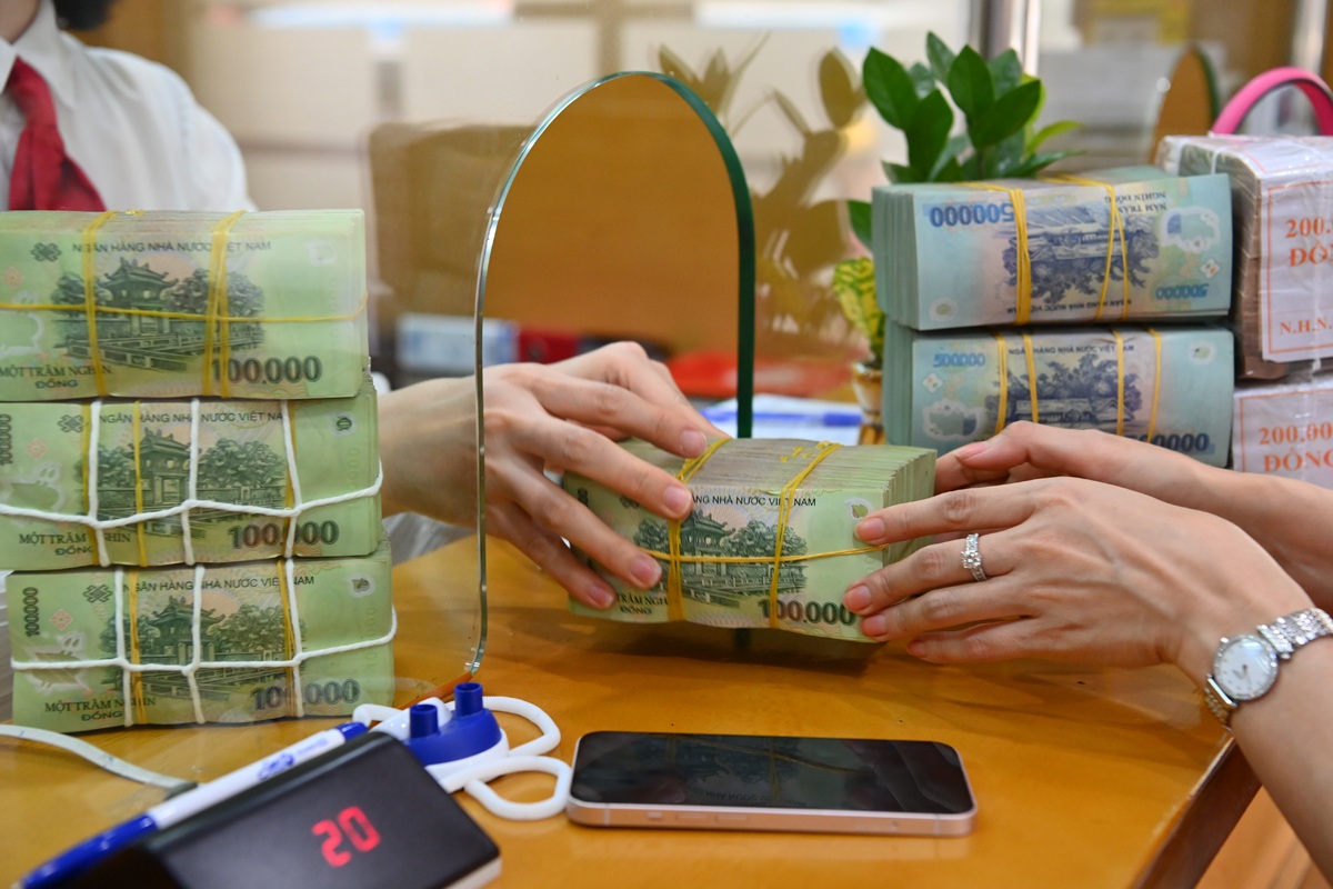 Ngân hàng ồ ạt báo lãi khủng, có lo nguy cơ ảo vì một chi tiết? - 1