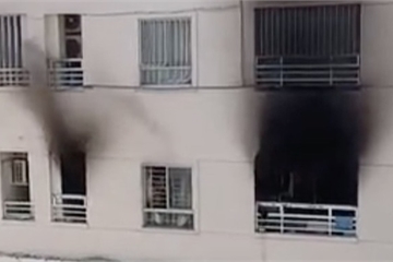 Cứu 6 người kẹt trong đám cháy tại chung cư ở TP.HCM