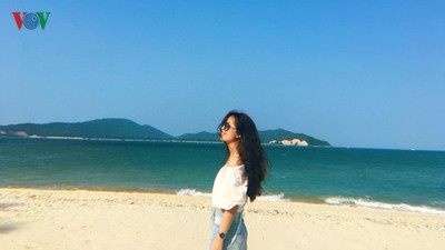 Tourists enjoy the pristine beauty of Co To island