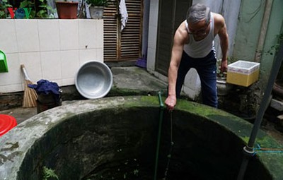 Ageing underground wells in the heart of Hanoi