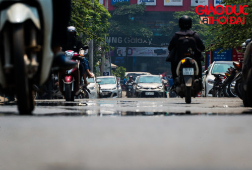 prolonged heat wave leaves people of hanoi sweltering hinh 2