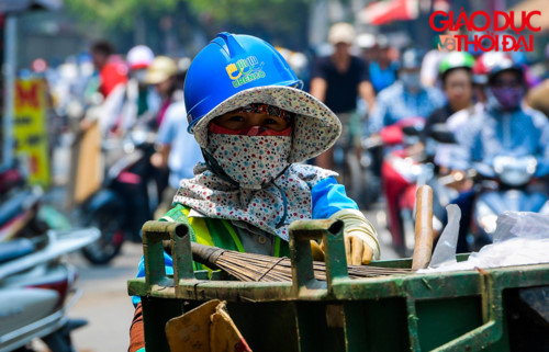 prolonged heat wave leaves people of hanoi sweltering hinh 3