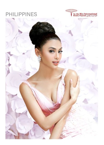 tuong san shines during glam shot segment at miss international pageant hinh 12