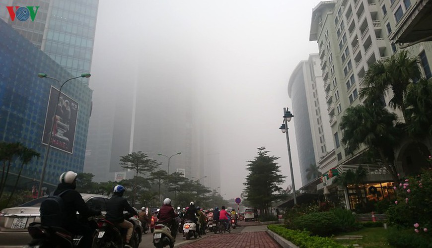 dense fog descends on the streets of hanoi hinh 11