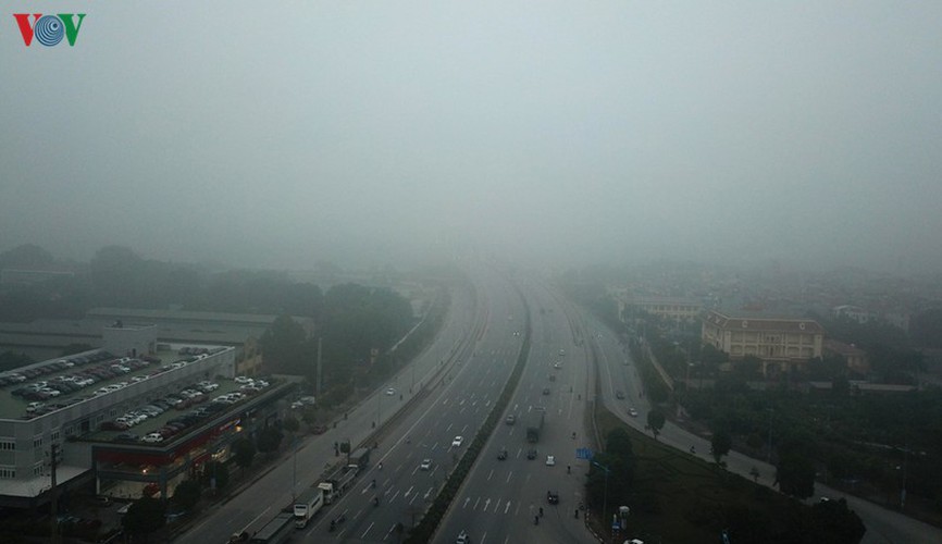 dense fog descends on the streets of hanoi hinh 4